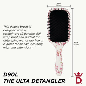 Denman wet-dry detangler brush for versatile grooming on damp or dry hair.