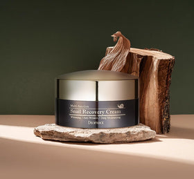 Deoproce Snail Mucin Face Cream on skin demonstrates fast absorption and a dewy finish.