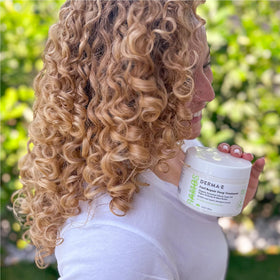 Derma E Ramos Curl Repair Deep Treatment on curls suggests improved manageability.