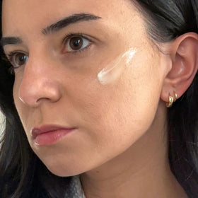 Derma E product on vanity shows smooth skin texture after use.