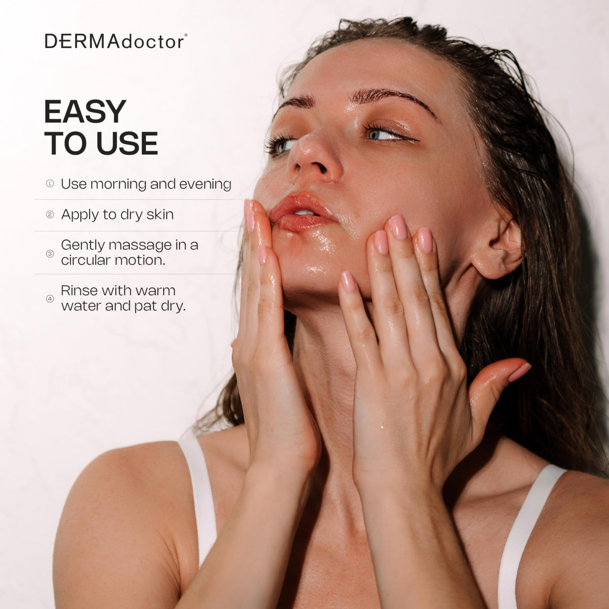 DERMAdoctor Glycolic Face Wash application on skin shows anti-aging prep.