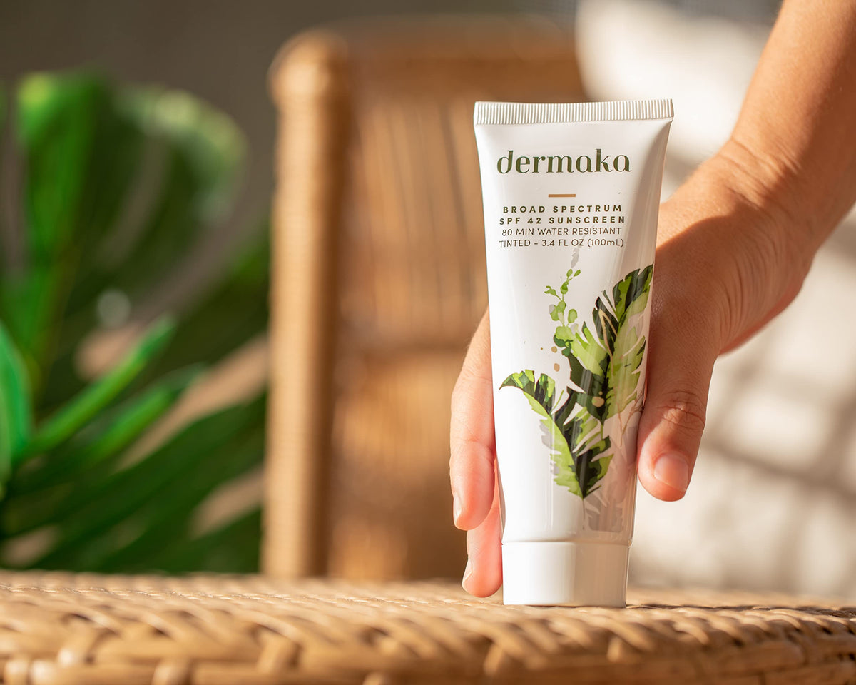 Dermaka aloe-based sunscreen being applied for hydration and gentle coverage.