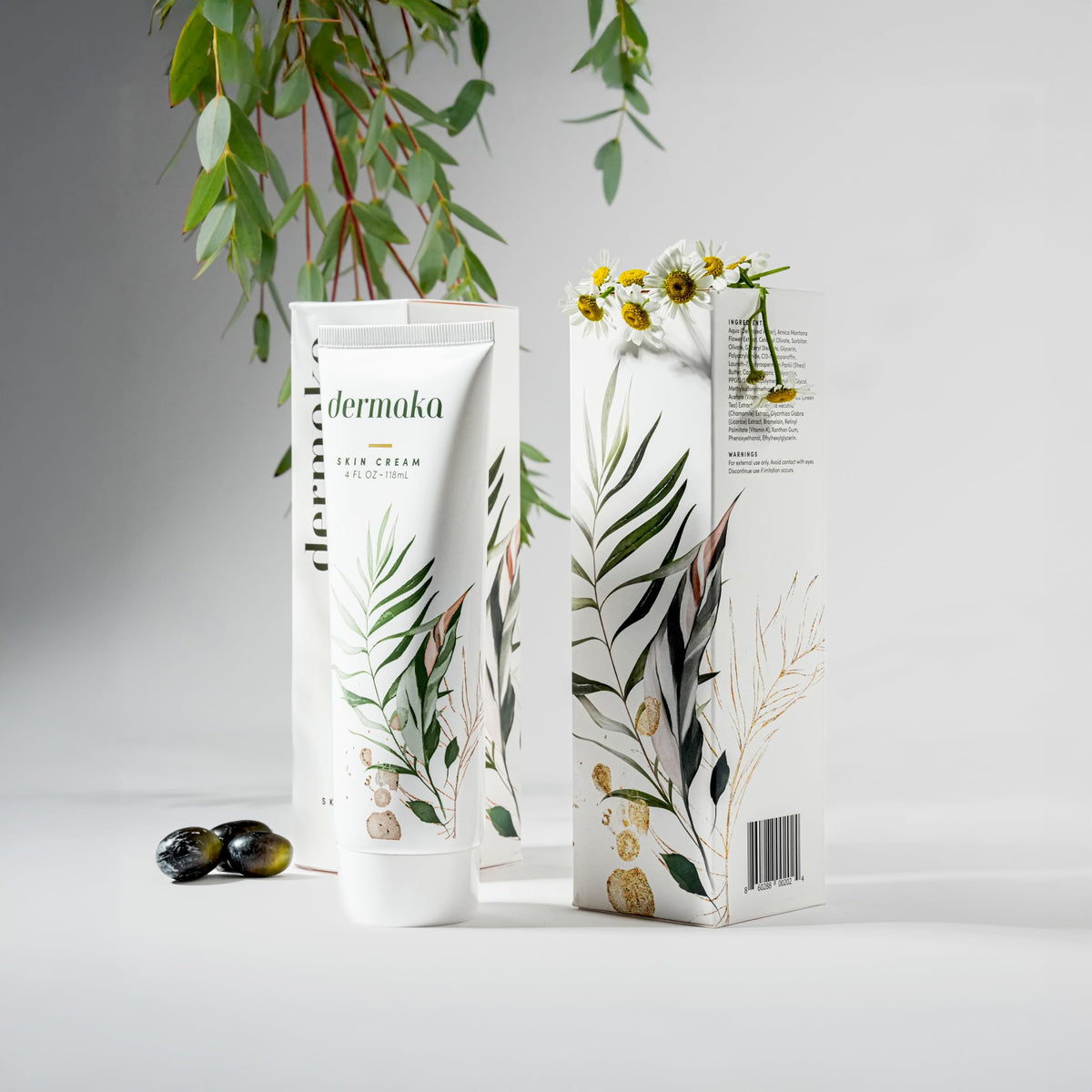 Dermaka Arnica Cream jar close-up showing natural ingredients and packaging.