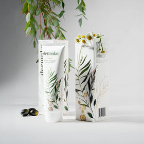 Dermaka Arnica Cream jar close-up showing natural ingredients and packaging.