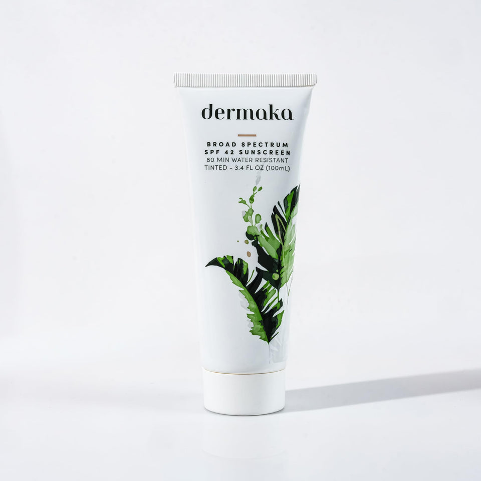 Dermaka lightly tinted mineral sunscreen bottle with SPF 42 for daily protection.