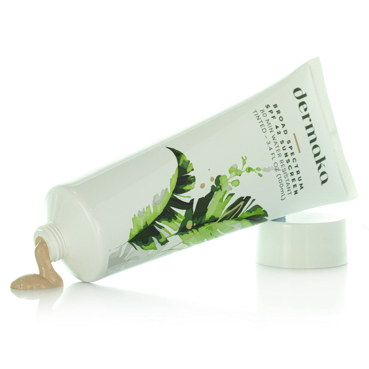 Dermaka tinted mineral sunscreen swatch on skin showing sheer coverage.