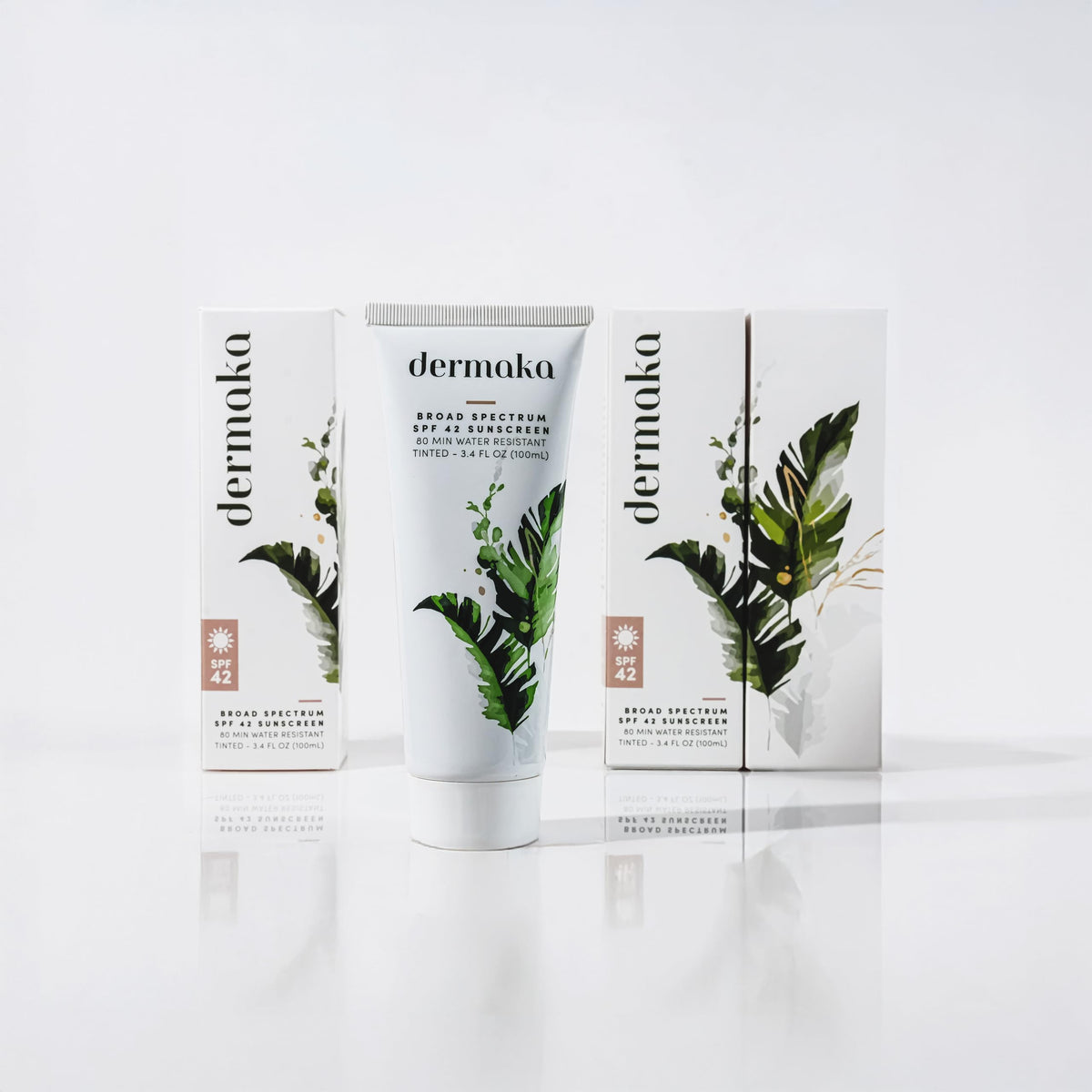 Dermaka SPF 42 mineral sunscreen bottle demonstrating water resistance use.