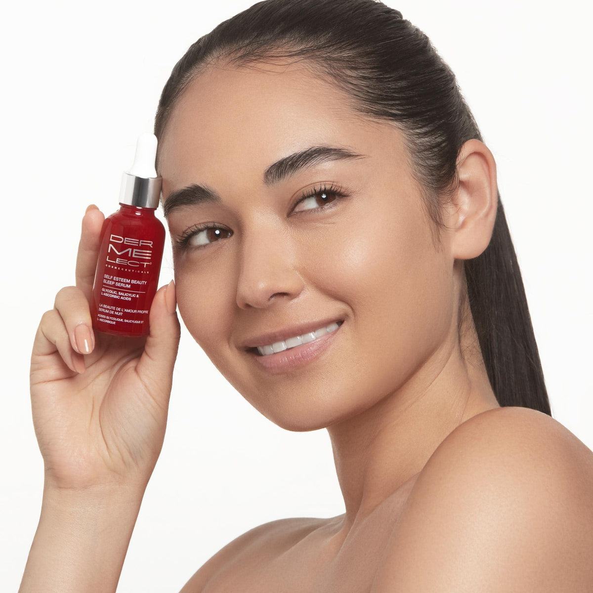 Dermelect bottle sits on vanity, capturing a clean skincare aesthetic.