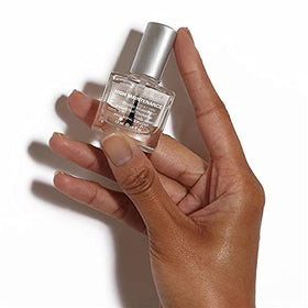 Dermelect High Maintenance top coat brush applying a high-gloss finish.