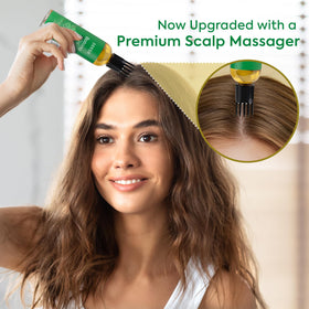 Dersie Batana Oil massager in action for even scalp distribution.