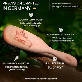 Desert Breeze Calcutta boar bristle brush in use demonstrating detangling and oil distribution