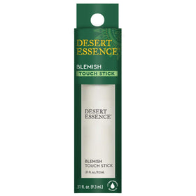 Close-up of Desert Essence blemish touch stick in use on skin.