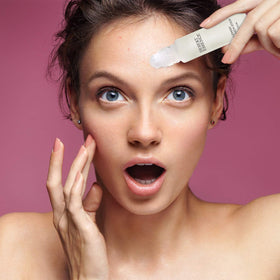 Non-oily texture of Desert Essence blemish touch stick shown.