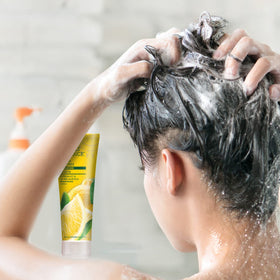 Desert Essence Lemon Shampoo ingredients list is visible nearby.