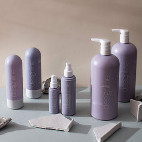 DESIGNLINE Enchanted Midnight Conditioner bottle demonstrates color-safe care for vibrant color