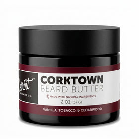 Detroit Grooming Co. Beard Butter bottle close-up showing 2oz size and premium conditioning.