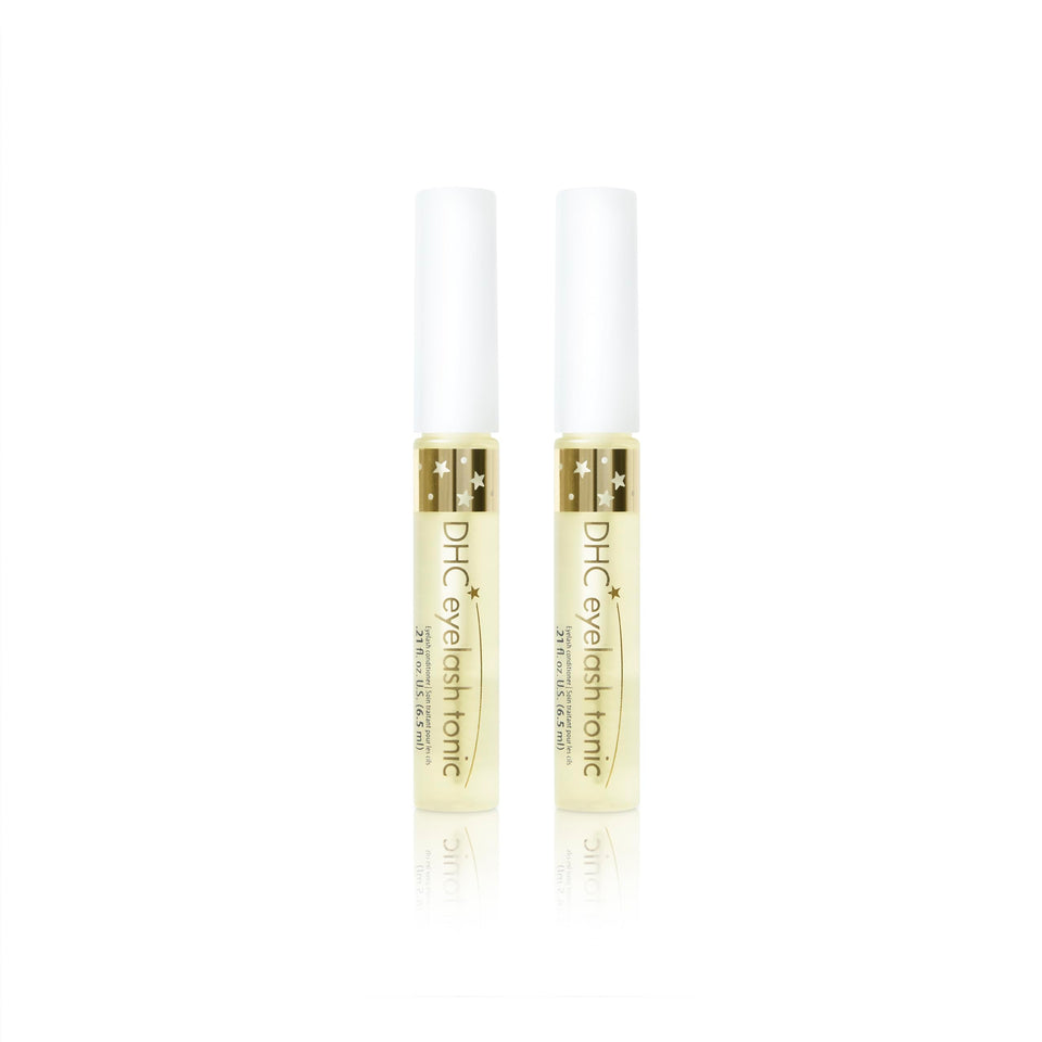 DHC Eyelash Tonic bottle front with colorless serum for daily conditioning.