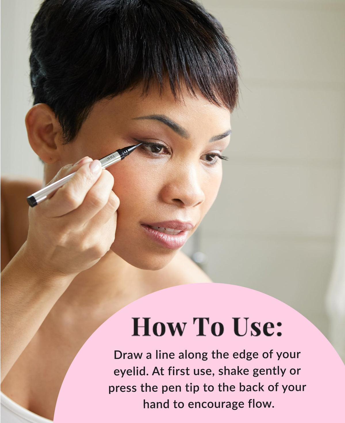 Cat-eye look with DHC Liquid Eyeliner EX using the sharp tip.