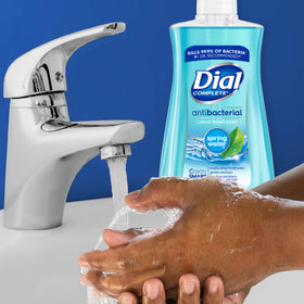 Dial antibacterial liquid hand soap creamy lather on hands enhances comfortable washing.