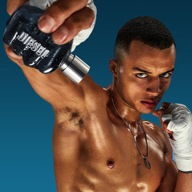 Diesel Only The Brave dark blue bottle image captures intensity with a premium masculine aesthetic.