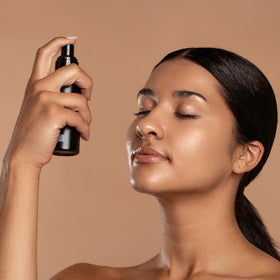 DIME Thirsty Face Mist setting spray for dewy finish after makeup