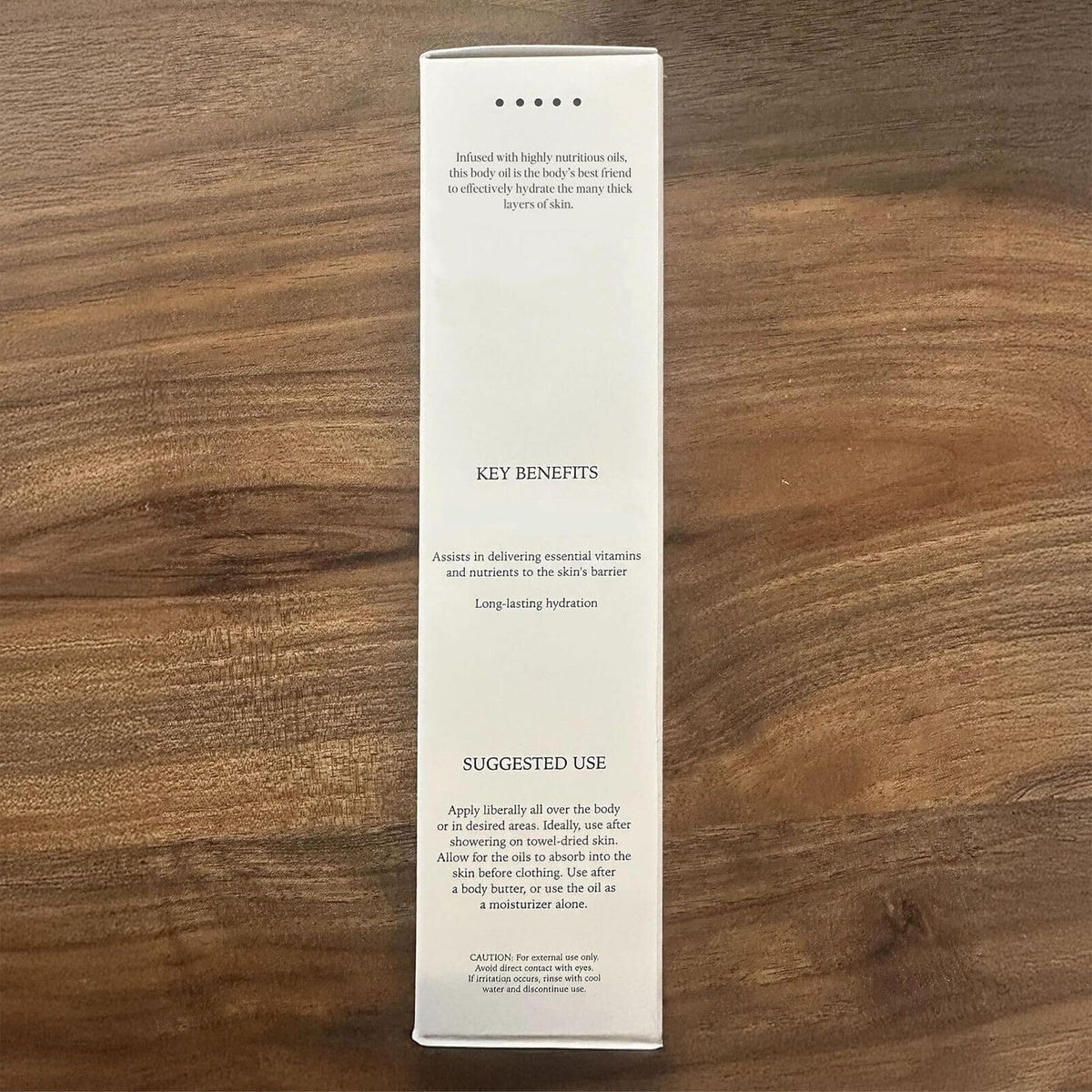 DIME Glaze Body Oil full-body application for even, hydrated skin.