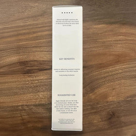 DIME Glaze Body Oil full-body application for even, hydrated skin.