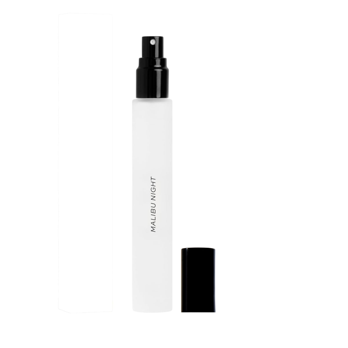 DIME Malibu Night bottle bathed in sunset glow, ideal for evening wear.