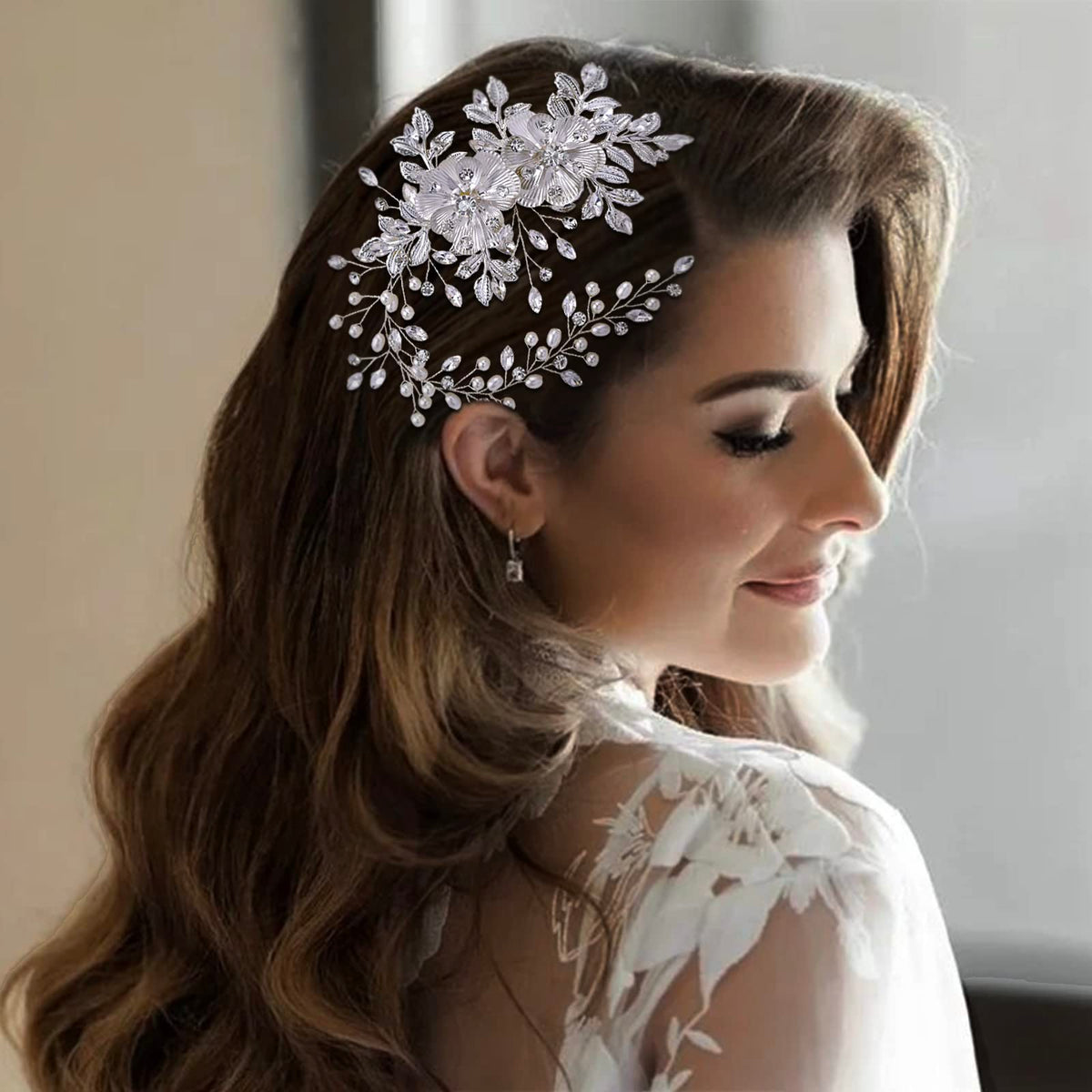 Dimnie bridal headwear silver diamond design adds elegant sparkle to wedding hairstyle.