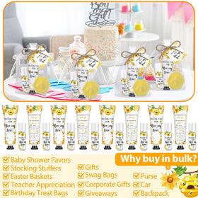 Dimsile baby shower table scene with bee decor and favors.