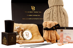 DinBer Wellness Box bath bomb offers moisturizing fizz and inviting fragrance.