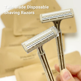 DincherBel straw-handle razor close-up shows lightweight ergonomic grip.