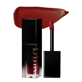 DINTO Blur-Glowy Lip Tint delivers a glossy finish for a glassy lip glow.