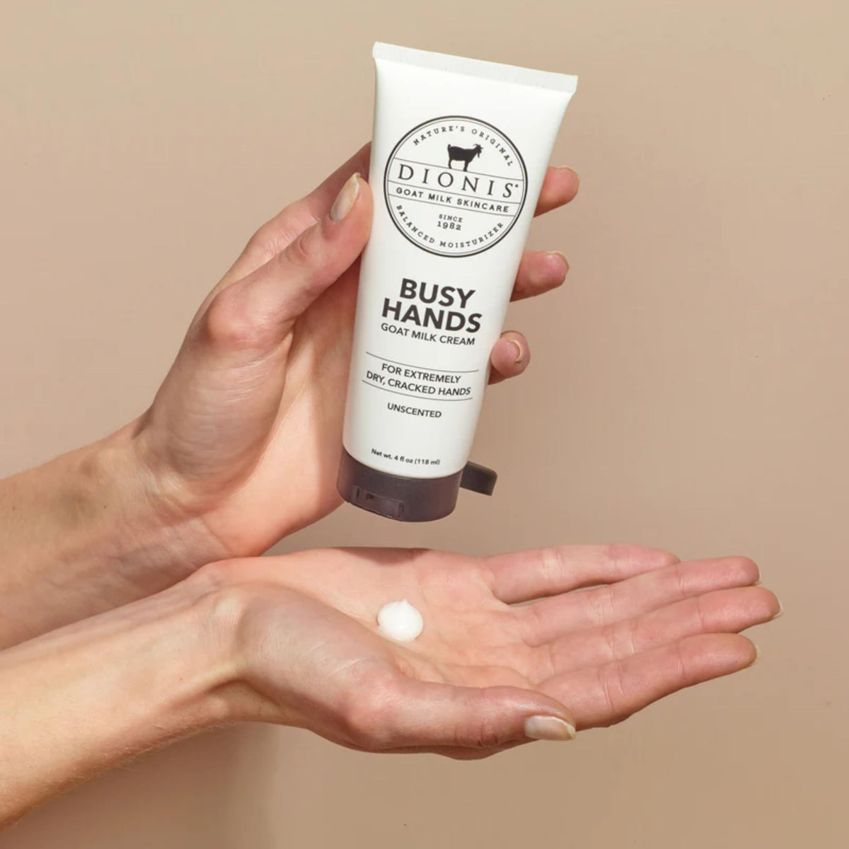 Close-up of Dionis label highlights goat milk blend and skin-friendly ingredients.