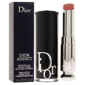 Dior Addict Shine Lipstick being applied for a glossy look on lips.
