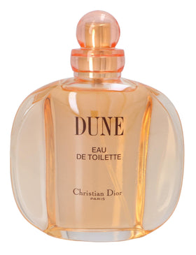 Dior Dune EDT bottle with spray mist on soft background for a refreshing feel.