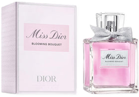 Dior Miss Dior Blooming Bouquet bottle cap closeup highlighting elegant design and fragrance.