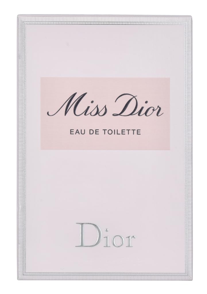 Dior Miss Dior bow detail on the bottle, capturing feminine branding and timeless charm.