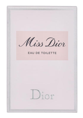 Dior Miss Dior bow detail on the bottle, capturing feminine branding and timeless charm.