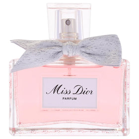 Dior Miss Dior spray mist captured during application for lasting scent