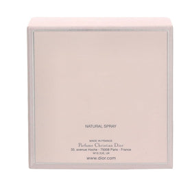 Miss Dior EDP on a dresser with soft lighting for evening occasions.