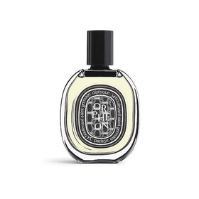 Diptyque Orpheon cedar note close-up highlighting the wood base.