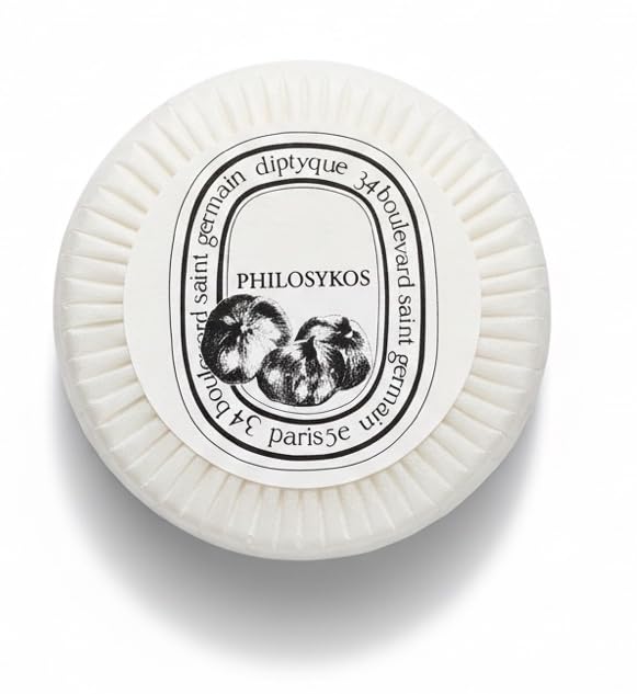 Philosykos pleat-wrap presentation with signature Diptyque sticker elevates amenities