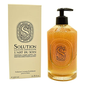 Diptyque Solution Exfoliating Hand Wash bottle on shelf, daily cleansing.