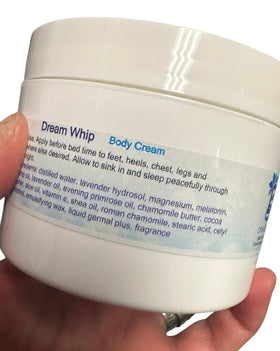 Diva Stuff Dream Whip cream massaged into hands for soft, hydrated skin.