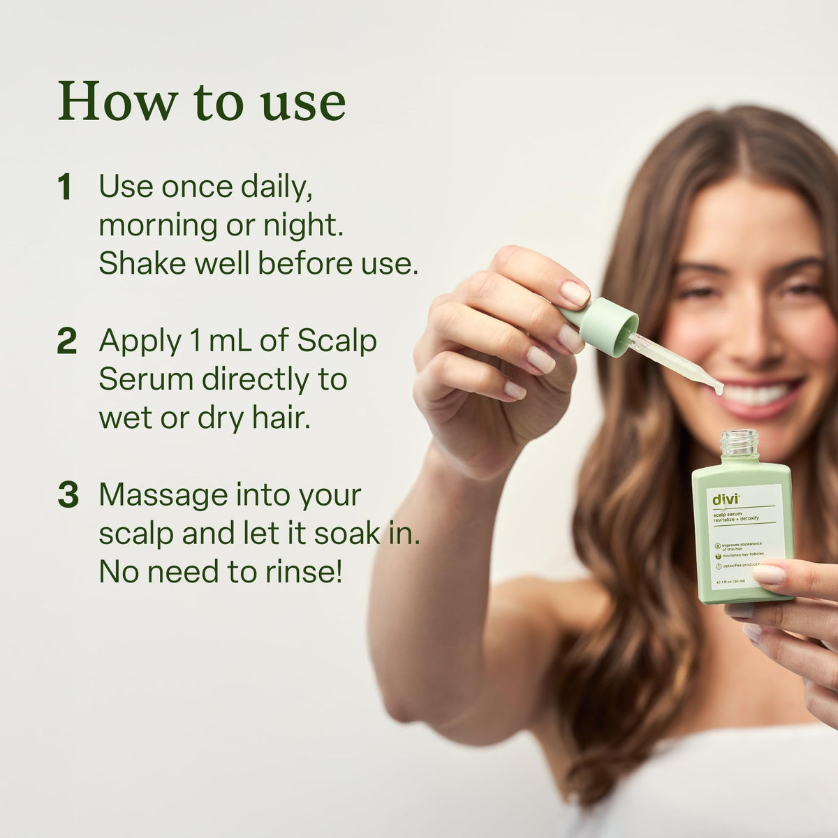 Divi volumizing conditioner bottle promoting smooth, bouncy hair