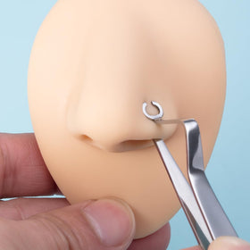 DJCIW ear piercing clamp secure grip keeps the ear steady during piercing.