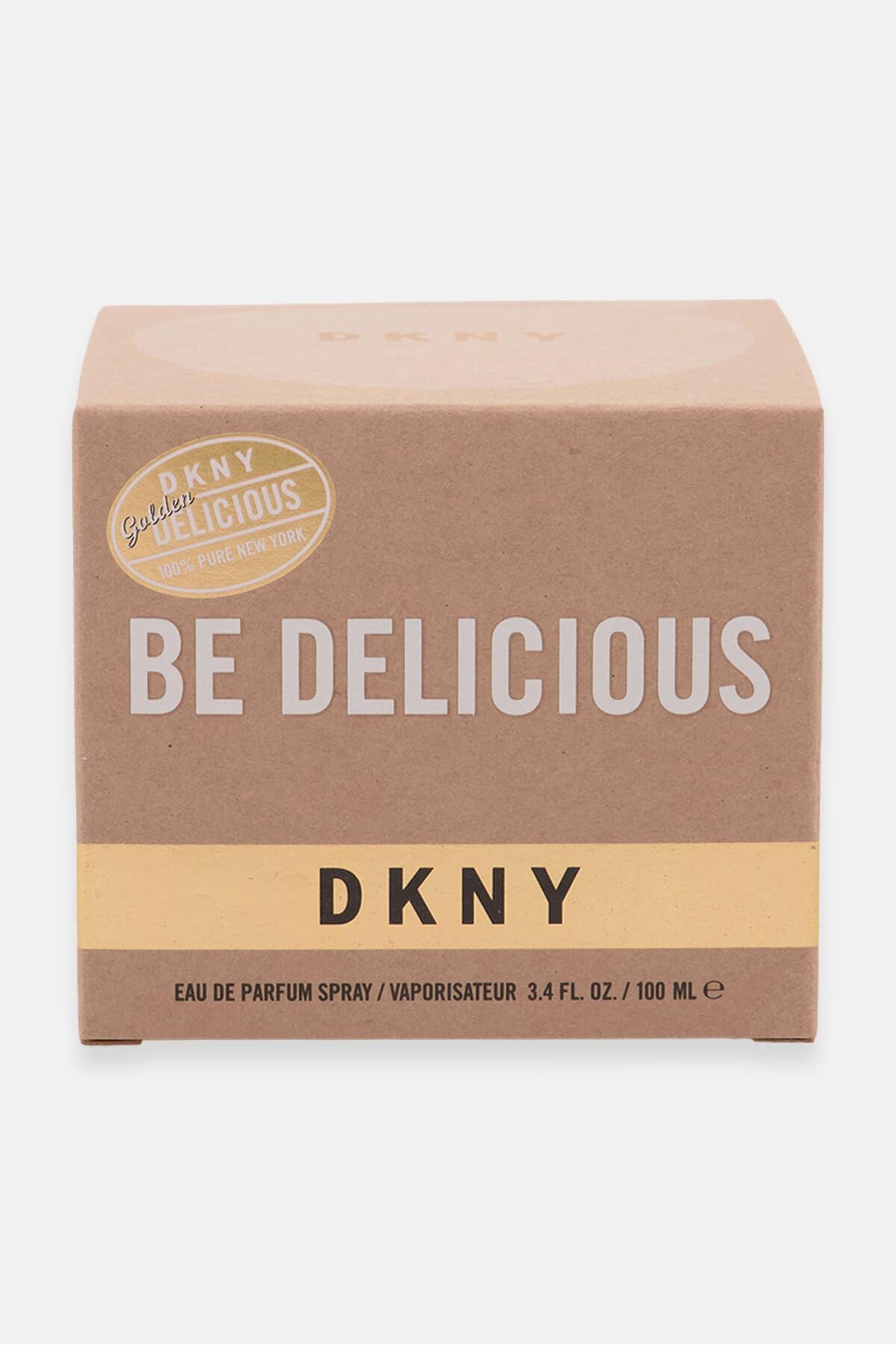 Close-up of the DKNY Golden Delicious bottle emphasizes juicy apple top notes.