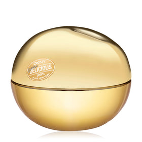 Close-up of DKNY Golden Delicious bottle highlighting sleek craftsmanship and fruit-rose contrast