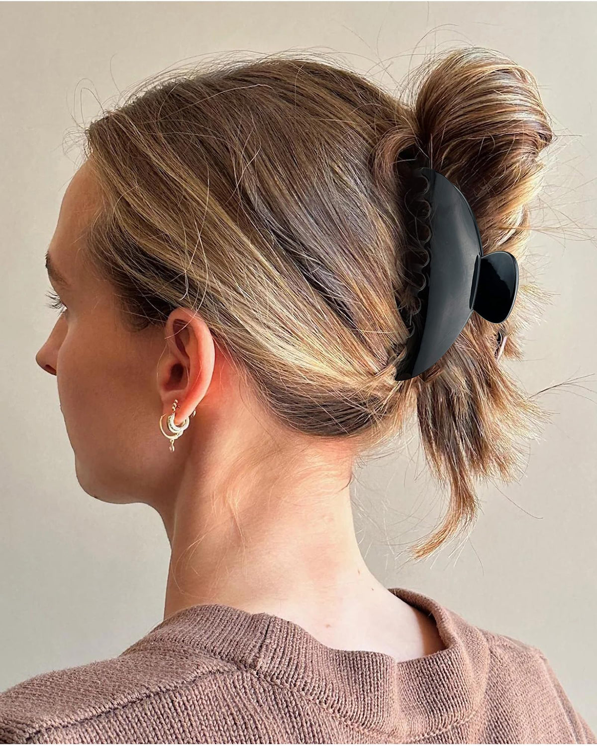 DMJHJY hair clip shown in a French twist for secure updos.